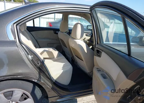 2009 Kia Optima Lx z USA, uszkodzony, nr VIN KNAGE228X95326013